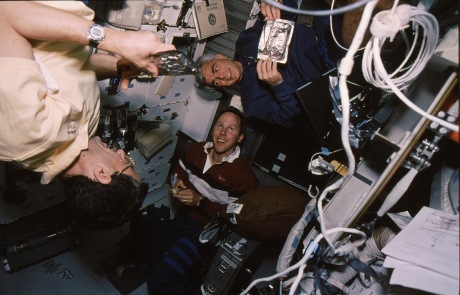 The Blue Shift -- Jay, Rich, and Tom -- enjoy a meal after a shift on the flight deck. We generally had about 2.5 hours after finishing work to eat, clean up, and take care of middeck chores before hitting the sleep stations. (NASA sts059-14-06)