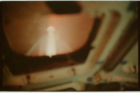 Entry plasma seen through the overhead windows of the shuttle flight deck. NASA S08-102-2835