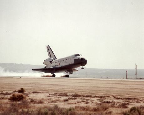 The main landing gear of the Space Shuttle Endeavour touches down at Edwards Air Force Base to complete the 11 day STS-59/SRL-1 mission. Landing occurred at 9:54 a.m., April 20, 1994. Mission duration was 11 days, 5 hours, 49 minutes. NASA image. NASA STS059(S)07