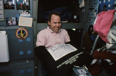 Tom Jones reloads Linhoff magazines, a daily challenge, on Endeavour's middeck. (NASA sts059-8-23)